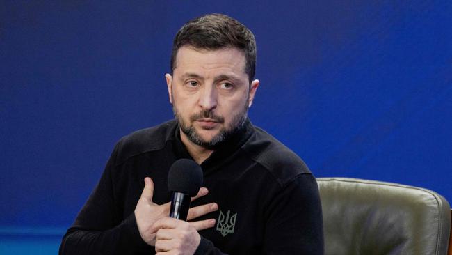 Ukraine's President Volodymyr Zelensky speaks during a joint press conference on the sidelines of the "Ukraine. Year 2025" forum in Kyiv on February 23, 2025, amid the Russian invasion of Ukraine. (Photo by Tetiana DZHAFAROVA / AFP)