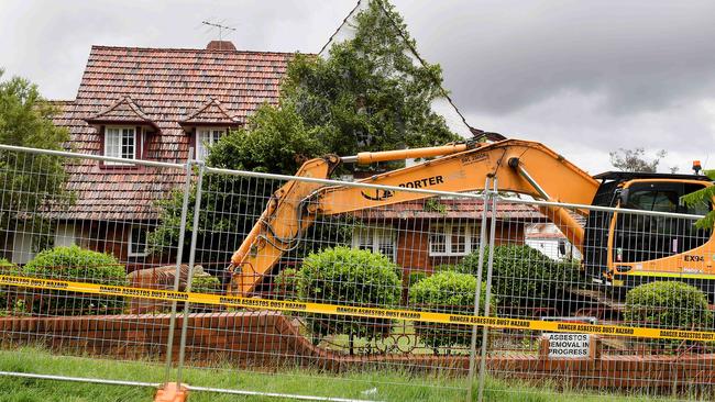 The excavator at historic Linden Lea.