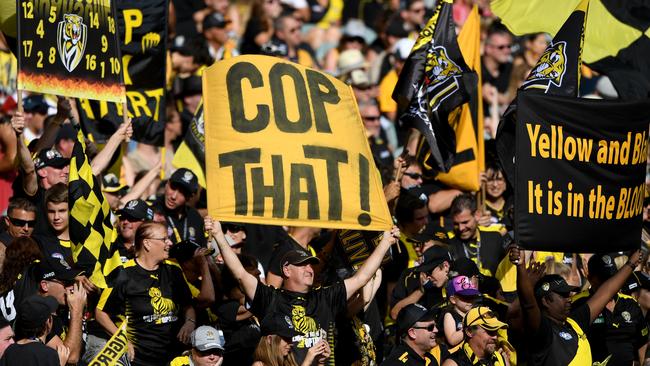 A Tigers cheer squad member was banned for calling the umpire a “maggot”. Picture AAP