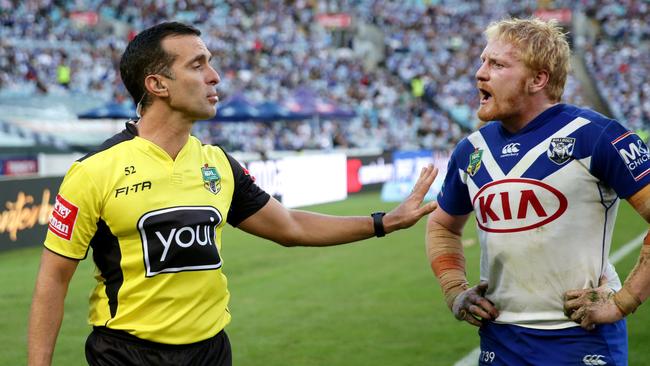 Referee Matt Cecchin and Bulldog James Graham during the round 7 NRL game between the Canterbury Bulldogs and the South Sydney Rabbitohs at ANZ Stadium . Picture : Gregg Porteous