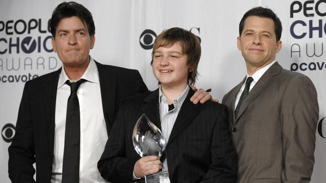 Charlie Sheen, Angus T. Jones and Jon Cryer winning the favourite TV comedy award for Two And A Half Men at the 35th Annual People’s Choice Awards in 2009. Picture: AP/Chris Pizzello