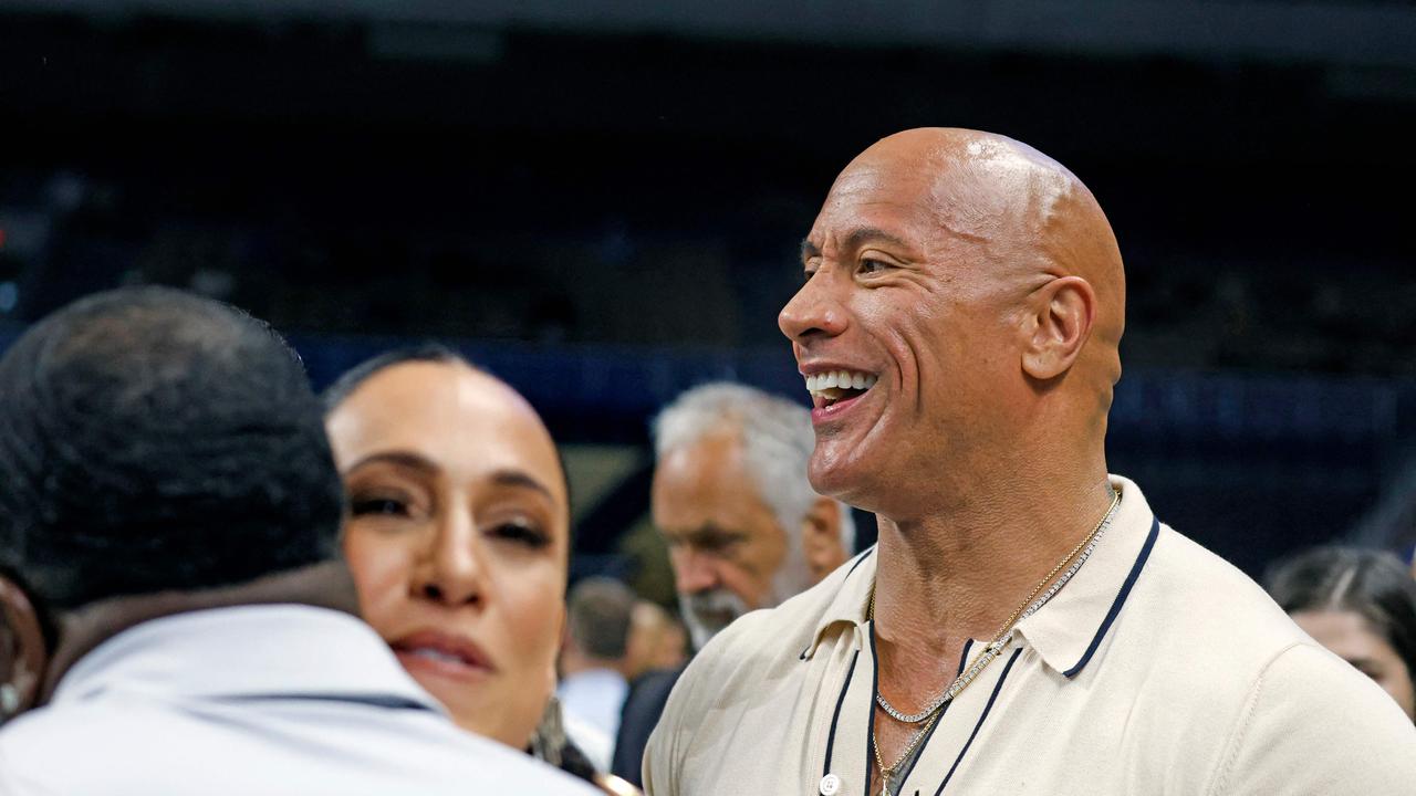 Johnson has become a celebrity figure known more for his acting than his wrestling career. (Photo by Ronald Cortes / GETTY IMAGES NORTH AMERICA / Getty Images via AFP)