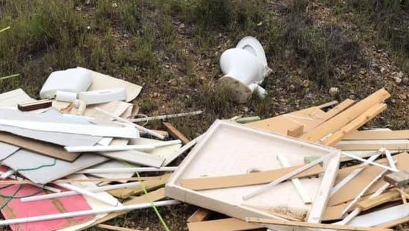 LOW BLOW: Bathroom rubbish dumped illegally at a Kilkivan property has been described as a 'low act'. Picture: Kylie Dowling