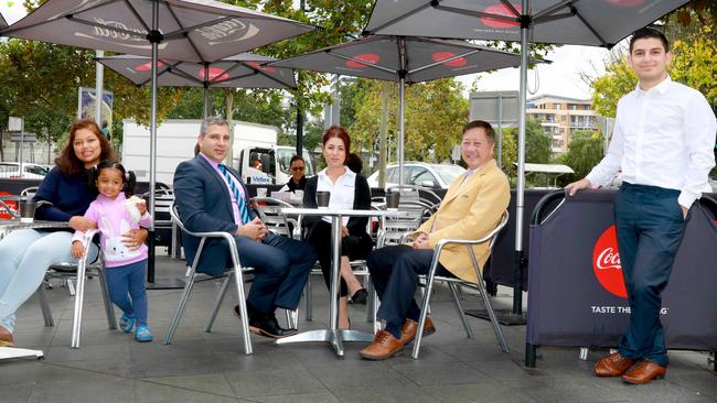 Greenway and Chifley voters Thamlini Sathasevam with her daughter, Dhiryaa Siraram, 3, Andrew Chrysanthou, Maryann Zammit, Eddy Tan and Jonathan Aslanidis in Main St, Blacktown, ahead of Saturday’s Federal Election. Picture: Angelo Velardo