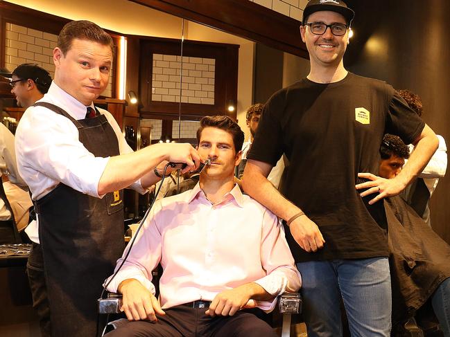 07/11/2018: Movember ambassadors Dan Price, Mark Kelly, Jonathan Leeming and Roshan Karu, with barber Dale Neal at Barberhood barber shop in Sydney.Pic by James Croucher