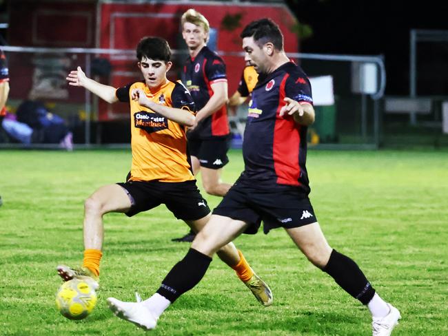 Mareeba's Robert Iacutone and Leichhardt's Bronson Koppen battle for possession in the Football Queensland Premier League Far North (FQPL 3) men's preliminary final match between the Leichhardt Lions and the Mareeba Bulls, held at Endeavour Park, Manunda. Picture: Brendan Radke