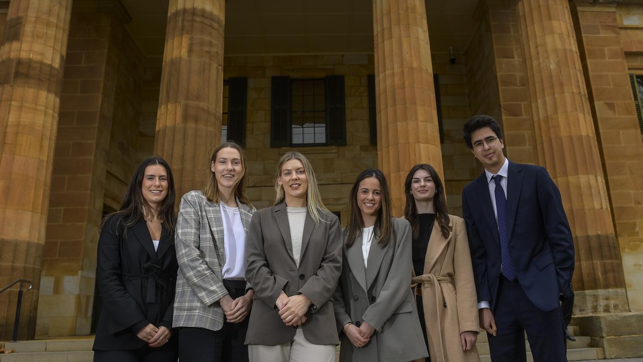 Rising star graduate lawyers, Maddison Lloyd, Shannon Cain, Kahlia Steinert, Kristen Camera, Claudia Van Eckeren and Chris Michalakas outside Adelaide Magistrates court. Picture: RoyVPhotography