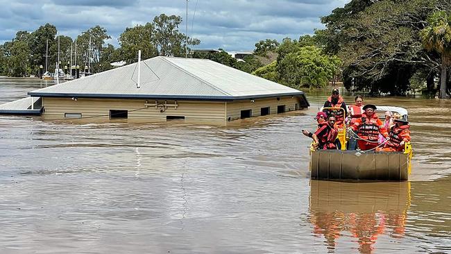 A boat rescue for people along the flooded streets around Maryborough in Queensland in February, 2022. Picture: Queensland Fire and Emergency Services / AFP