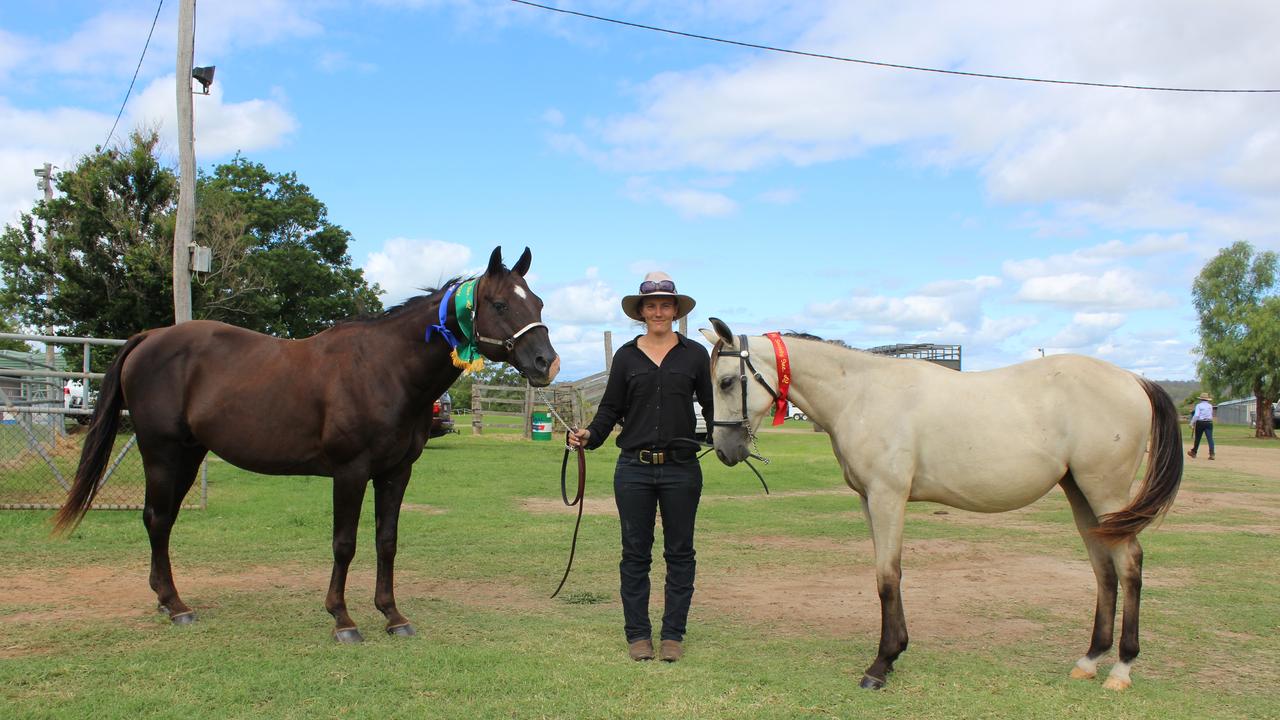 Horse owner Deejay with her stallion Flying dollar doc five pot and filly Sweetie gonna givem lip at the Murgon Show. Photo: Laura Blackmore