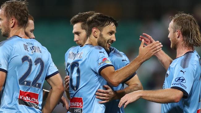 Sydney FC players celebrate Milos Ninkovic’s late winner. Picture: Getty Images