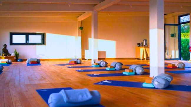 Guests can partake in yoga and other activities to enhance wellbeing.