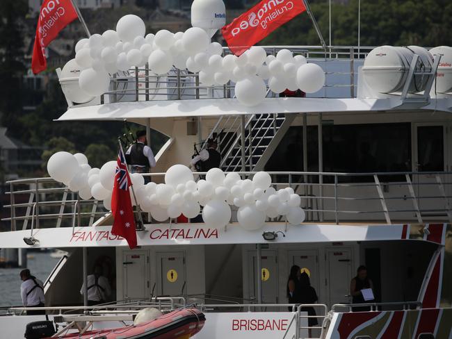 The boat decked out with balloons.
