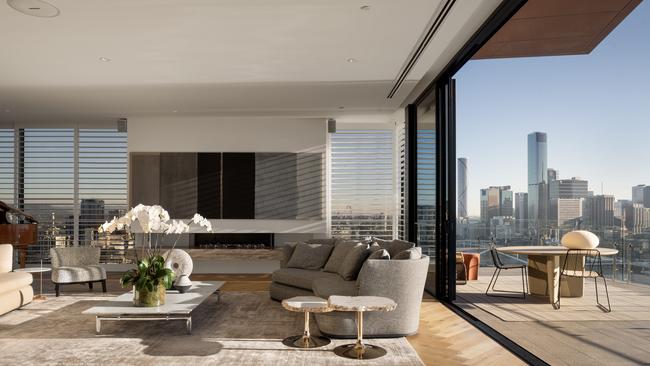 A huge, open-plan living area opens out to the balcony.