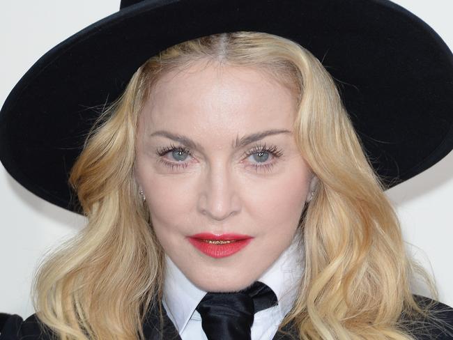 LOS ANGELES, CA - JANUARY 26: Singer Madonna attends the 56th GRAMMY Awards at Staples Center on January 26, 2014 in Los Angeles, California. (Photo by Jason Merritt/Getty Images)