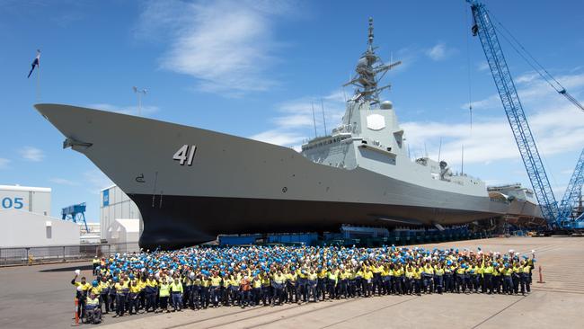 ASC workers celebrate the day before the Air Warfare Destroyer Brisbane was launched last year in Adelaide.