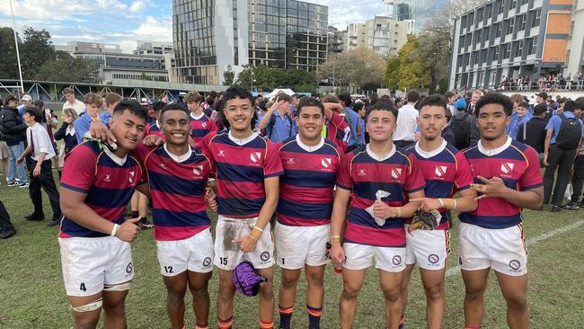 Brisbane State High School sudents and players celebrate the win, including Dredyn Takave and Tauaka Leofa/