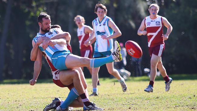 Lachlan Smith in action for Penrith Rams AFL team against Manly-Warringah.