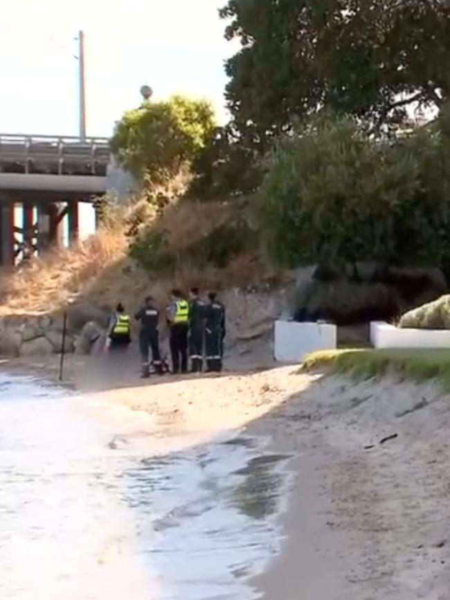 The police at the scene where the girl was pulled from the river near the Fremantle Traffic Bridge. Picture: 7 NEWS