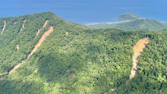 Scarred mountainsides highlight the damage done by Tropical Cyclone Jasper and the floods, Douglas Shire Michael Kerr says.