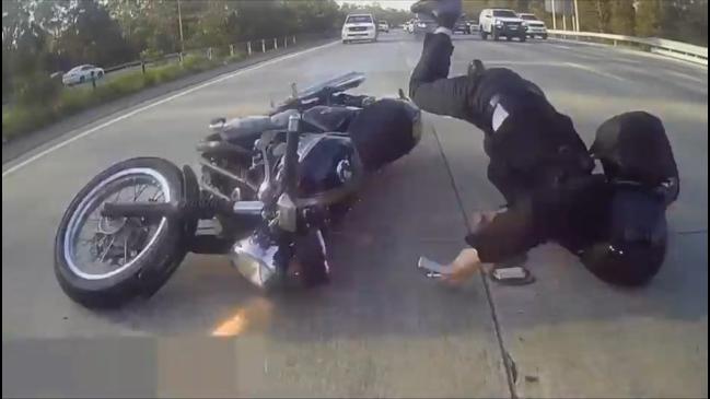 Dashcam captures motorcyclist's horror headfirst crash on Gold Coast Motorway