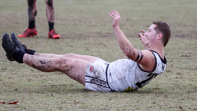 EDFL: Hillside v Roxburgh Park at Hillside Reserve, Melbourne, May 6 2023. Jake Talintyre of Roxburgh Park slips over as he kicks a goal.Picture : George Sal