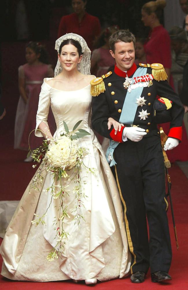 Australia’s own Princess Mary, wearing an ivory gown by Danish designer Uffe Frank, and Crown Prince Frederik were married on May 14, 2004. Picture: AFP