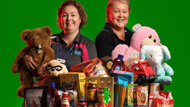 Melissa Pedersen from ICYS and Karen McCoombes from The Queensland Times celebrate the completion of the Adopt a Family Appeal, where all 250 families were adopted in 2019.