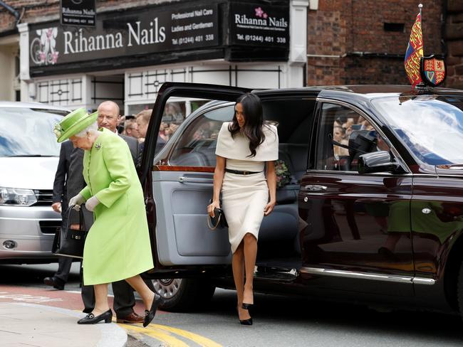 Britain's Queen Elizabeth II and Britain's Meghan Markle, Duchess of Sussex arrive at the Storyhouse during their visit to Chester, Cheshire. Picture: AFP