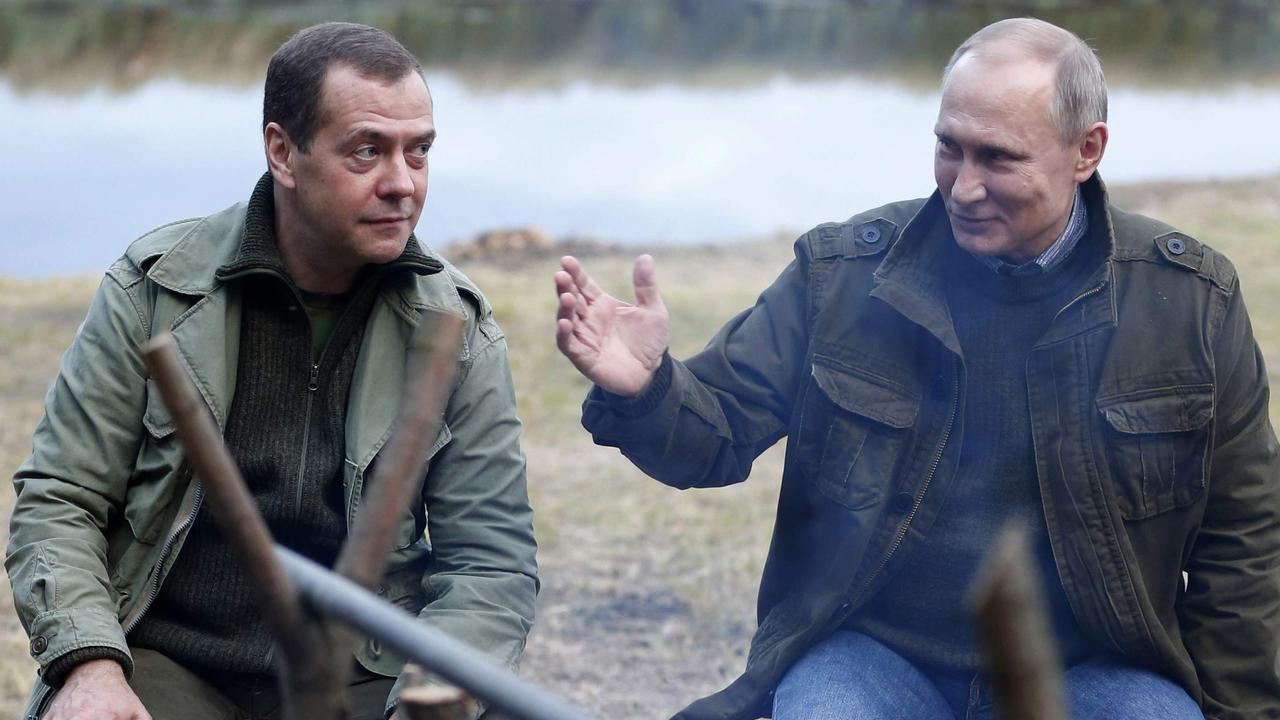 Former president Dmitry Medvedev, left, has gone from moderate to fanatic. Picture: STR/Sputnik/AFP