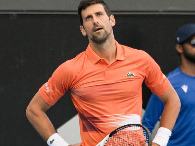 Serbian tennis player Novak Djokovic reacts during his first round doubles match with Canadian Vasek Pospisil at the ATP Adelaide International tournament in Adelaide on January 2, 2023. (Photo by Brenton EDWARDS / AFP)