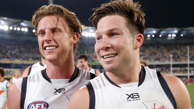 BRISBANE, AUSTRALIA - SEPTEMBER 14: Lachie Whitfield (left) and Toby Greene of the Giants celebrate during the 2019 AFL Second Semi Final match between the Brisbane Lions and the GWS Giants at the Gabba on September 14, 2019 in Brisbane, Australia. (Photo by Michael Willson/AFL Photos via Getty Images)