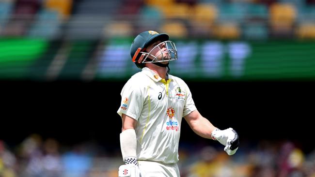 Travis Head of Australia looks dejected after losing his wicket during day two of the First Test match between Australia and South Africa at The Gabba on December 18, 2022 in Brisbane, Australia. (Photo by Bradley Kanaris/Getty Images)