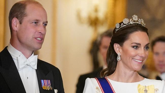 Prince William, pictured here with Princess Catherine, is also featured in Omid Scobie’s new book. Picure: AFP