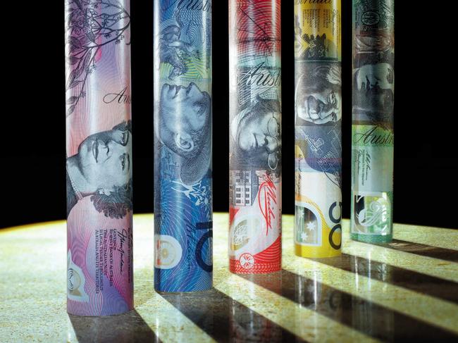 03/02/2009 FEATURES: Generic pic of Australian bank notes rolled into cylinders, $5, $10, $20, $50 and $100 bills.