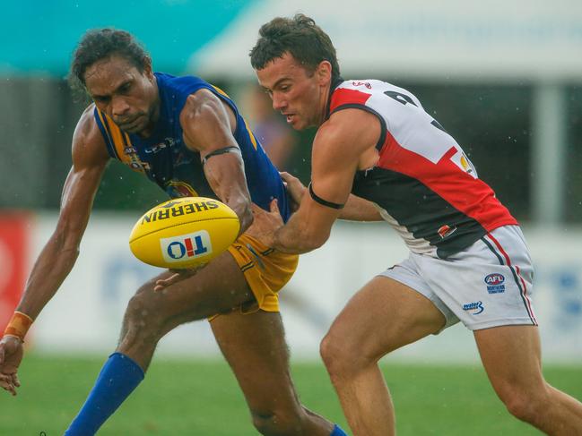 Liam Patrick and Dean Staunton in the NTFL Round 13 match between Wanderers and Southern Districts at TIO Stadium. Picture: Glenn Campbell