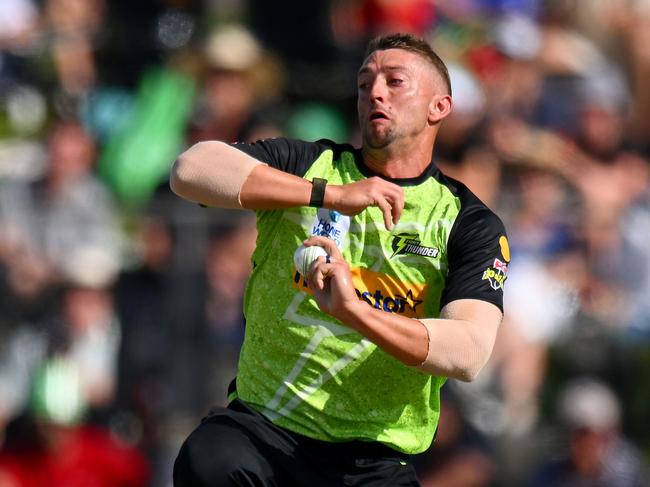 ALBURY, AUSTRALIA - DECEMBER 23: Daniel Sams of Sydney Thunder bowls during the BBL match between Melbourne Stars and Sydney Thunder at Lavington Sports Ground, on December 23, 2023, in Albury, Australia. (Photo by Morgan Hancock/Getty Images)