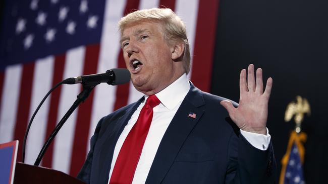 Donald Trump at a rally in Michigan yesterday. Picture: AP