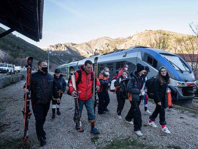 Travellers getting off the 'Train des Neiges' (the snow train) at Tende Station which travels between the Alpine regions of France and Italy. Picture: AFP