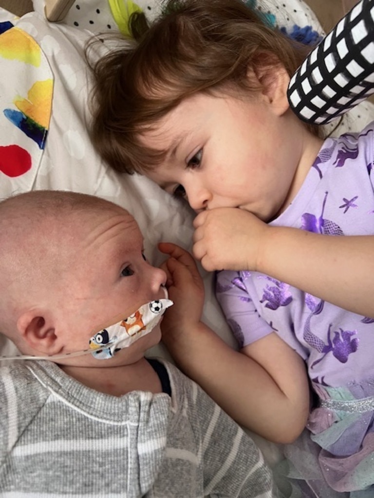 Darcy loves her little brother and always helps the family. Picture: Supplied by family