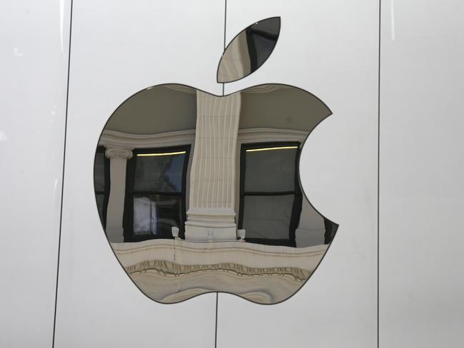 FILE - This Thursday, May 19, 2016, file photo shows the Apple logo on the side of the Apple Union Square store, in San Francisco. Apple reports earnings Tuesday, May 2, 2017. (AP Photo/Eric Risberg)