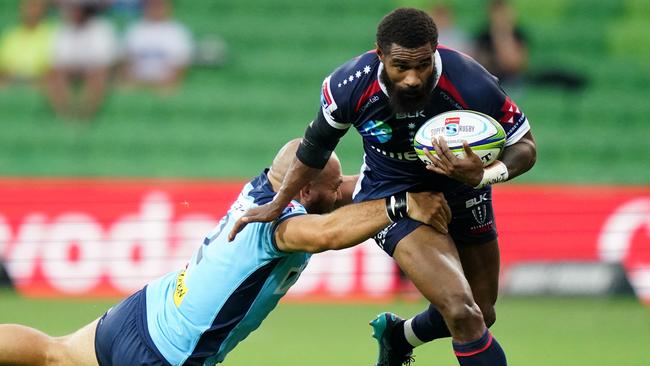 Marika Koroibete breaks through a tackle by Robbie Abel. Picture: AAP