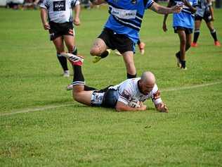 HOW TIMES CHANGE: Miriam Vale half Corey Paulsen scores for the Magpies in their win over a gallant but depleted Sharks earlier this season. Picture: Neil Redfern GLA300419MV