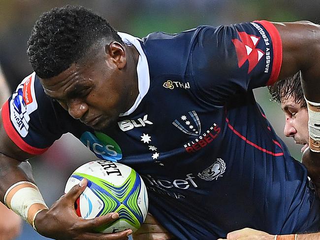 MELBOURNE, AUSTRALIA - MARCH 08: Isi Naisarani of the Rebels is tackled during the round four Super Rugby match between the Rebels and the Brumbies at AAMI Park on March 08, 2019 in Melbourne, Australia. (Photo by Quinn Rooney/Getty Images)