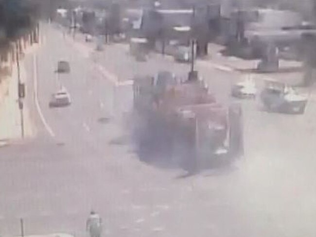 CCTV screen grab of a truck travelling through the intersection at the bottom of the South eastern freeway after losing its brakes.
