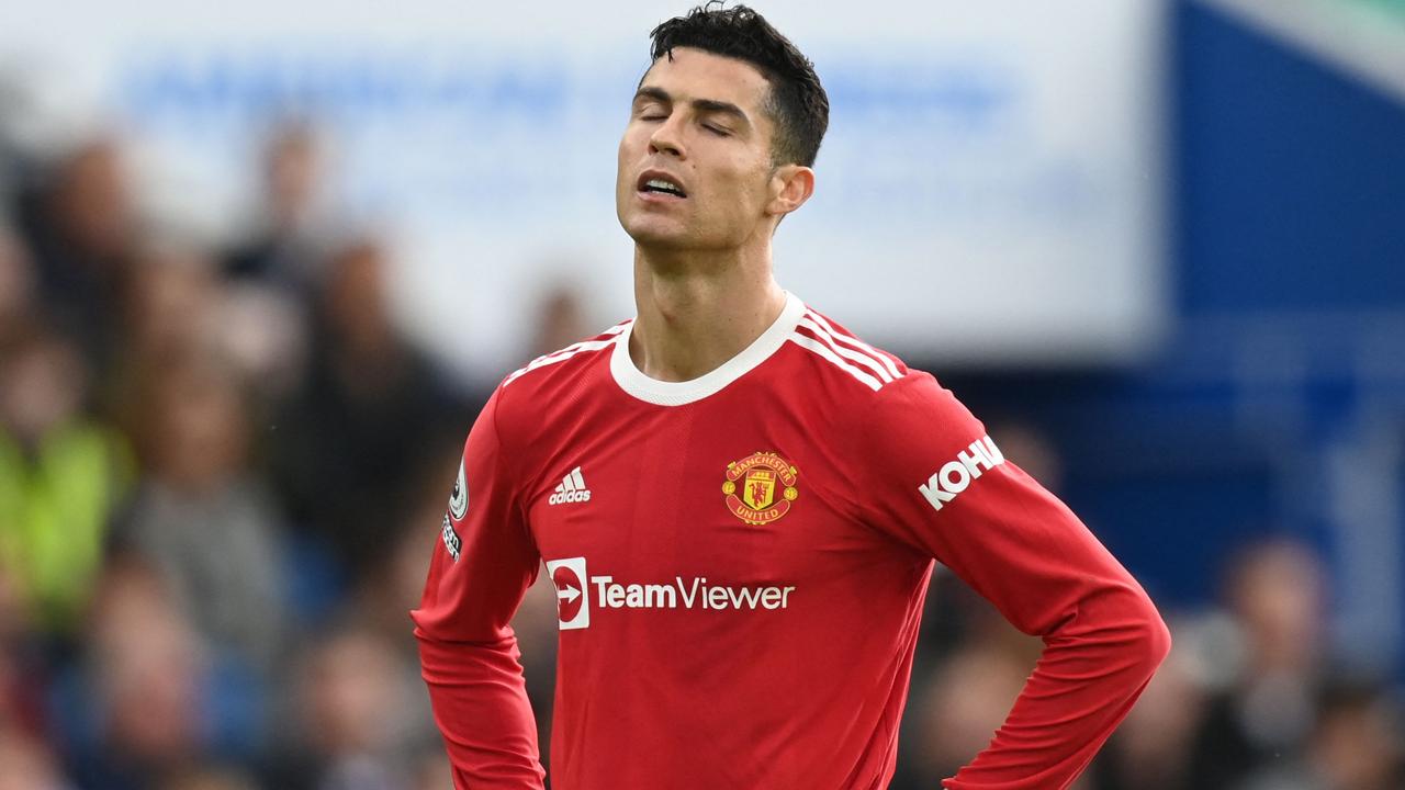 Manchester United's Portuguese striker Cristiano Ronaldo reacts during the English Premier League football match between Brighton and Hove Albion and Manchester United at the American Express Community Stadium in Brighton, southern England on May 7, 2022. (Photo by Glyn KIRK / AFP)
