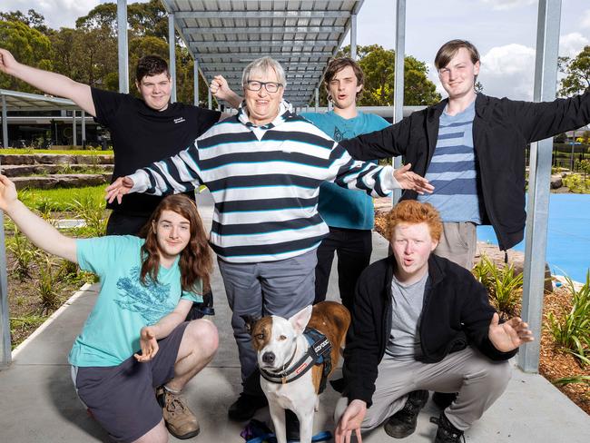 MELBOURNE, NOVEMBER 29, 2022: Croydon Community School is the second most improved school in the state. L to R students Jared, Aaron, David, Judd and Andrew with principal Bronwyn Harcourt and dog Amos. Picture: Mark Stewart