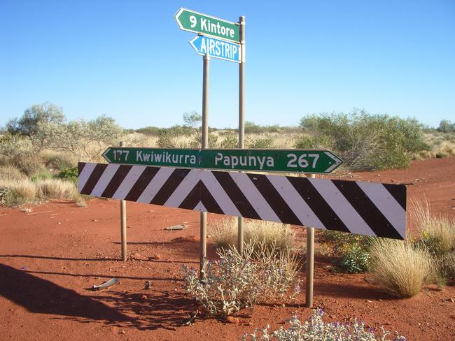 A 21 year old man is fighting for life after a single vehicle crash near Papunya on Sunday morning.