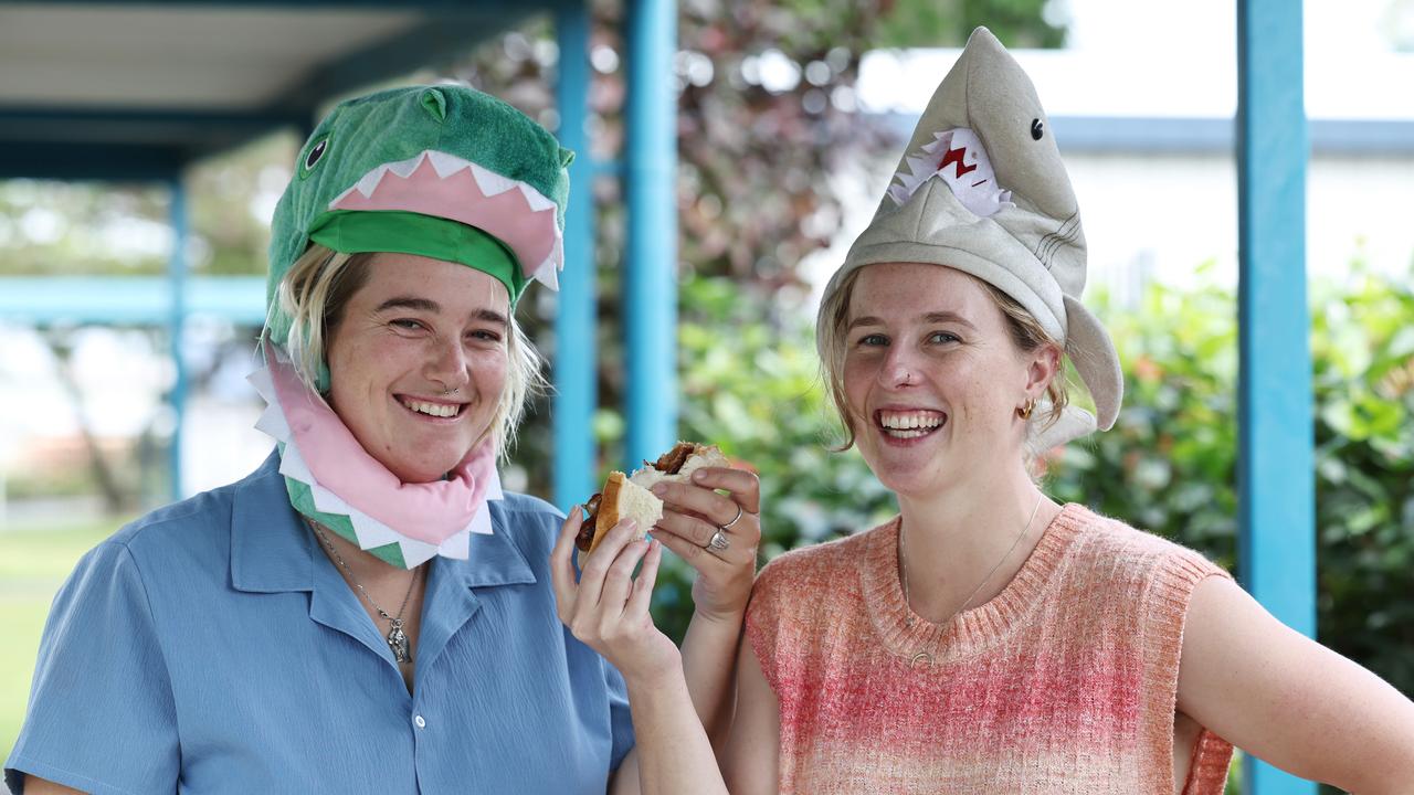 Many Cairns voters were dismayed to see the demise of the sausage sizzle at many voting booths around the city. Remie Bampton and Eli Cropp drove to Parramatta Park State School just to eat a democracy sausage after voting at a booth with no barbecue. Picture: Brendan Radke
