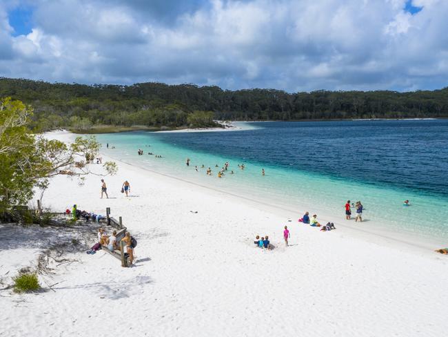 Lake McKenzie is a freshwater lake located on Fraser Island, Australia. The white silica sand and pure waters are some of the biggest attractions in Australia.