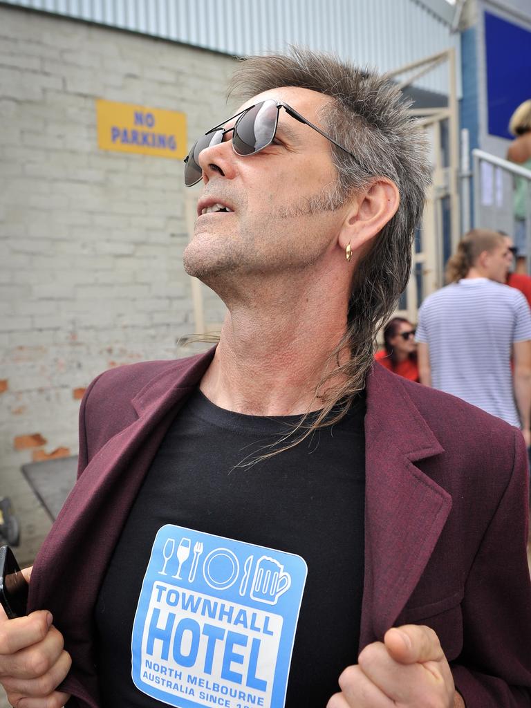 Participant are seen during Mulletfest, a special event designed to celebrate the hairstyle that's all about business at the front, party at the back, at Chelmsford Hotel in Kurri Kurri, NSW. (AAP Image/Perry Duffin) 